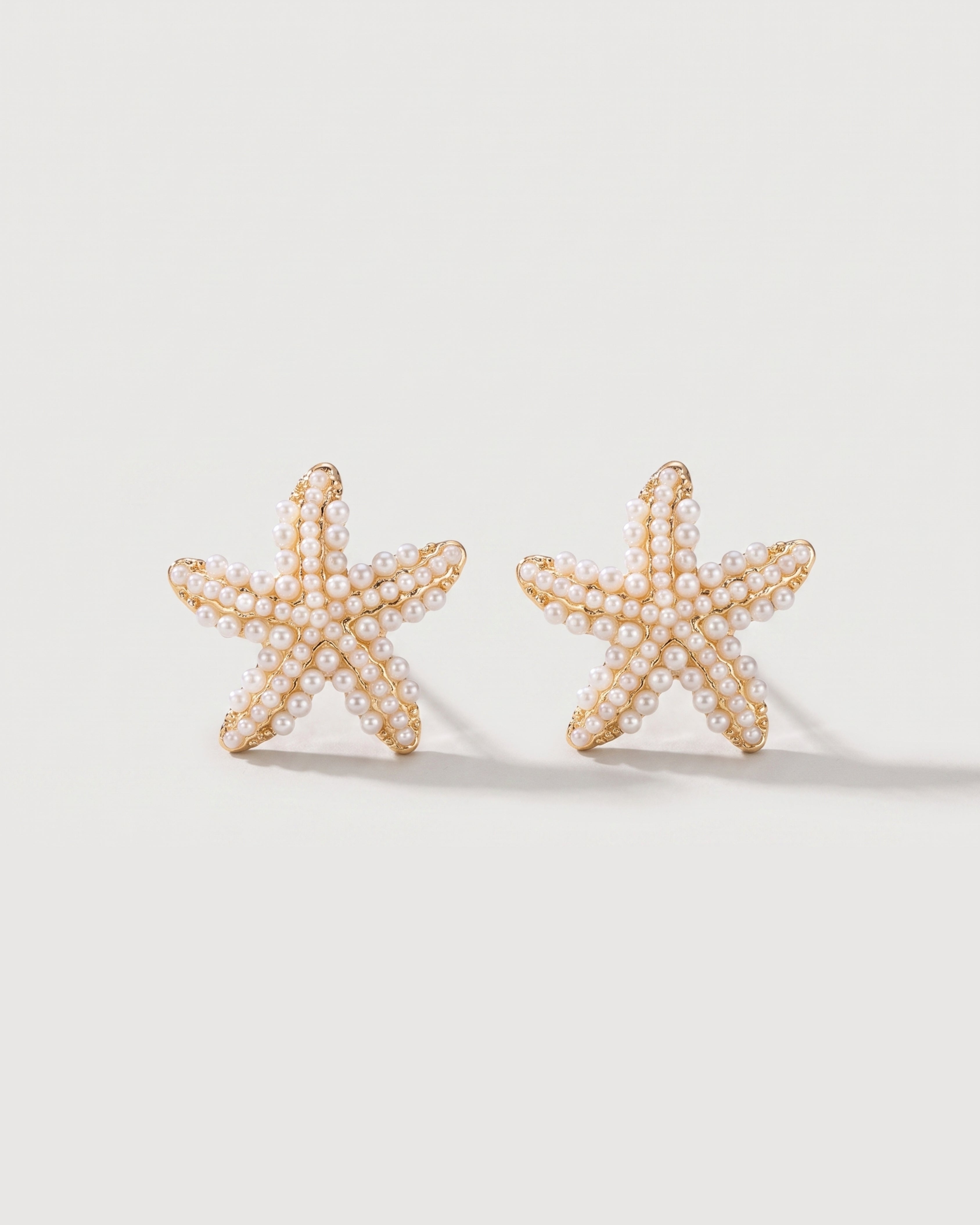 Pineapple Starfish Pearl Earrings in starfish pearl — front view, RABUKO