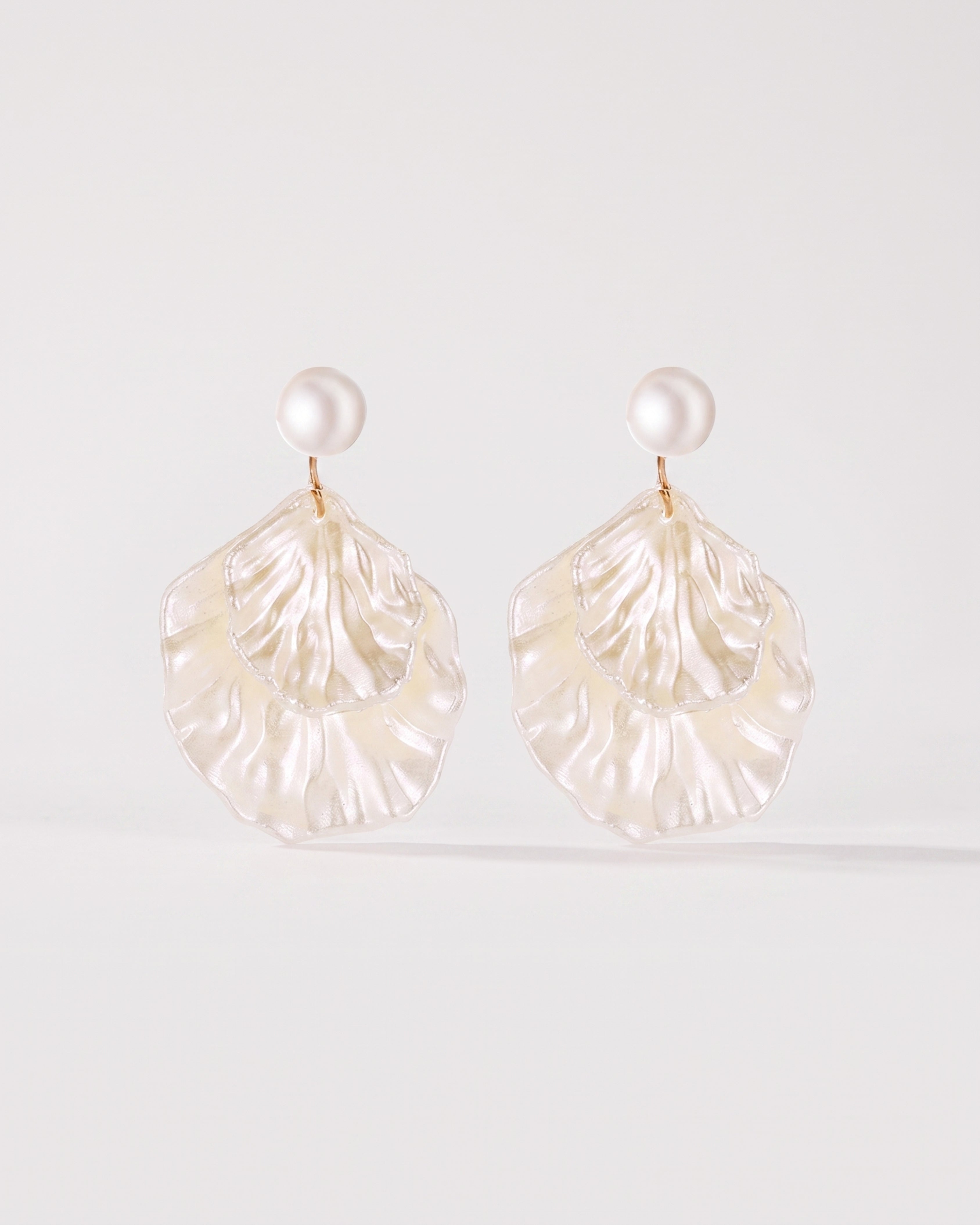 Pearl Shell Earrings — front view, RABUKO