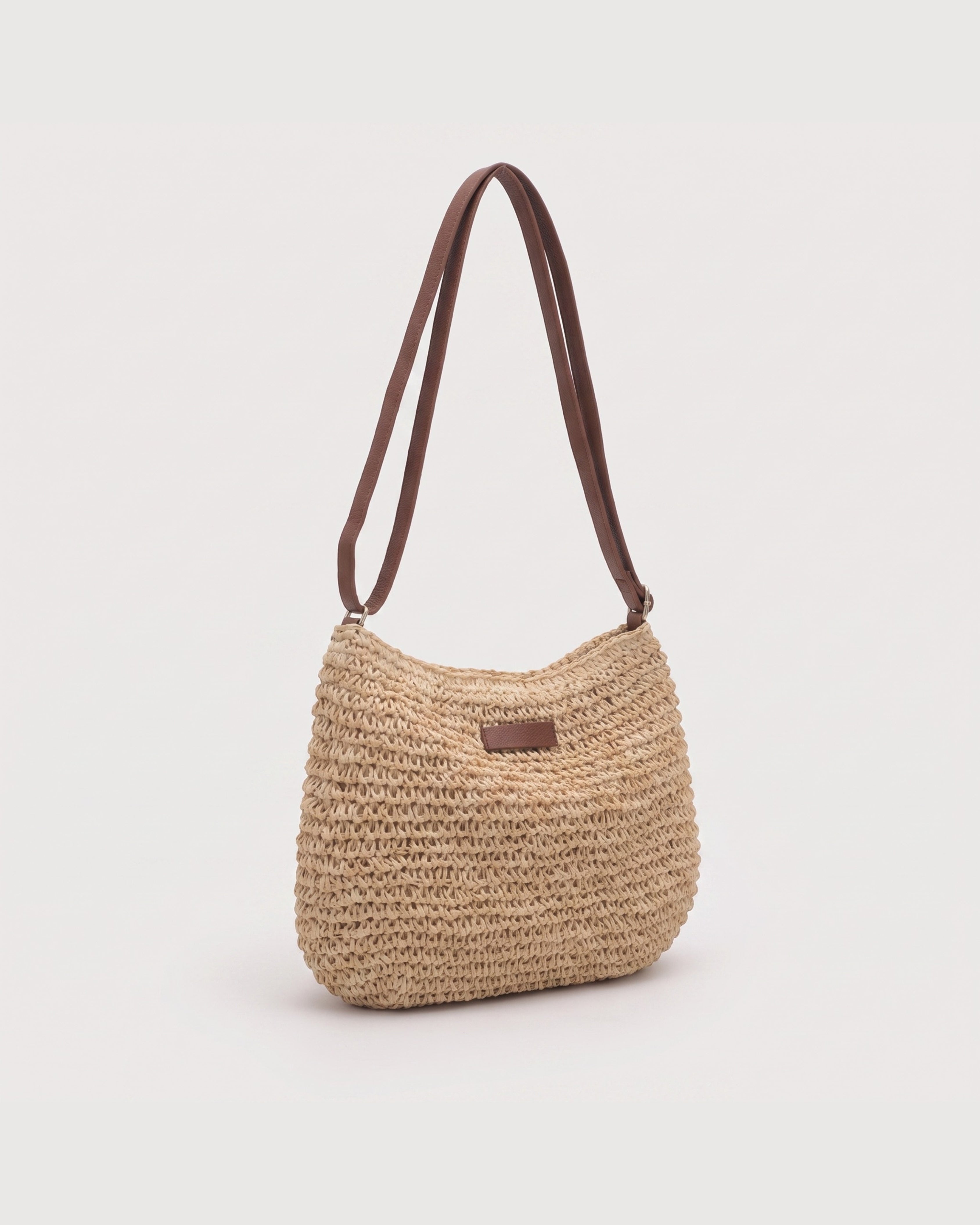 Raffia-Effect Tote Bag in beige — three-quarter view, RABUKO