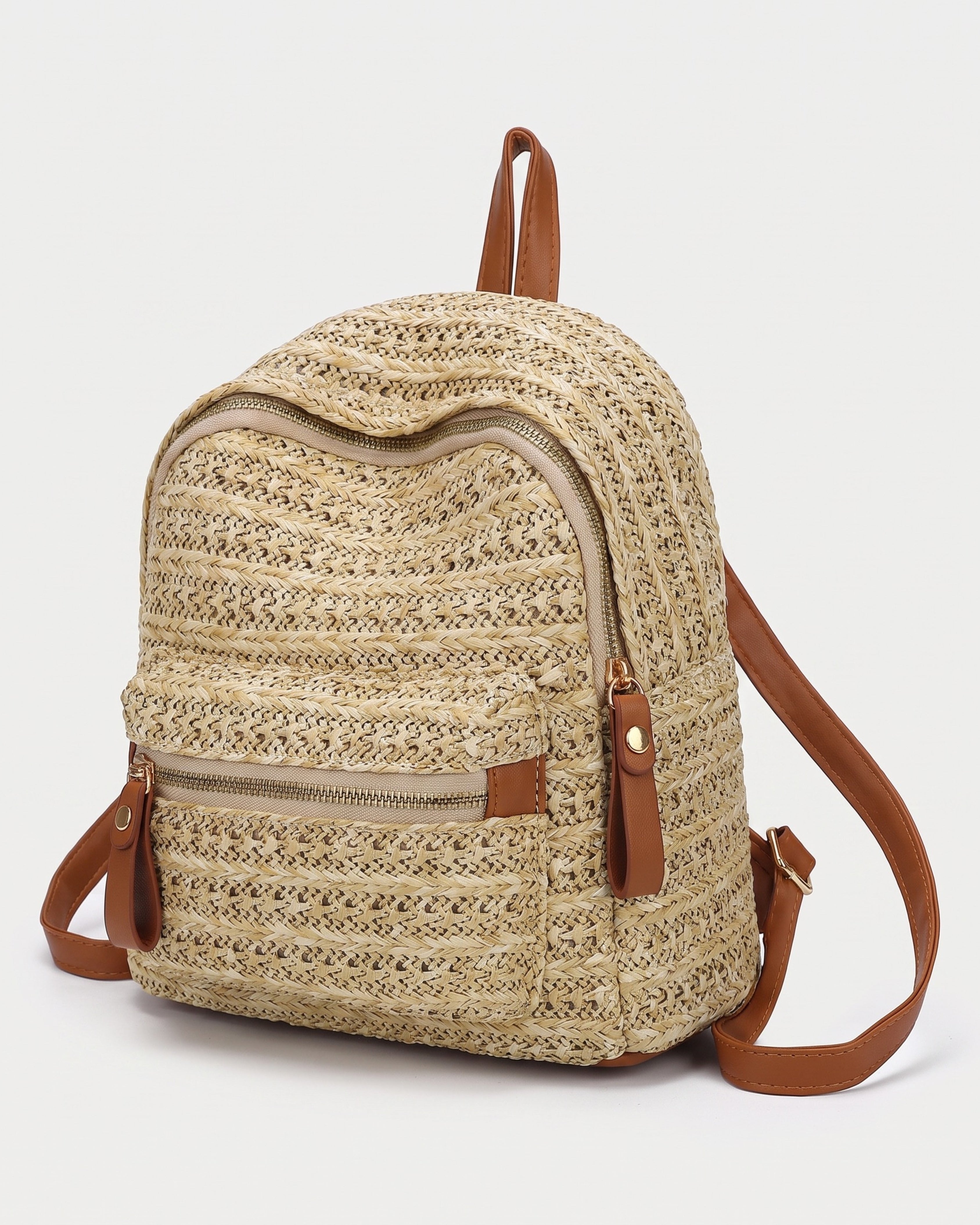 Woven Straw Backpack in khaki — three-quarter view, RABUKO