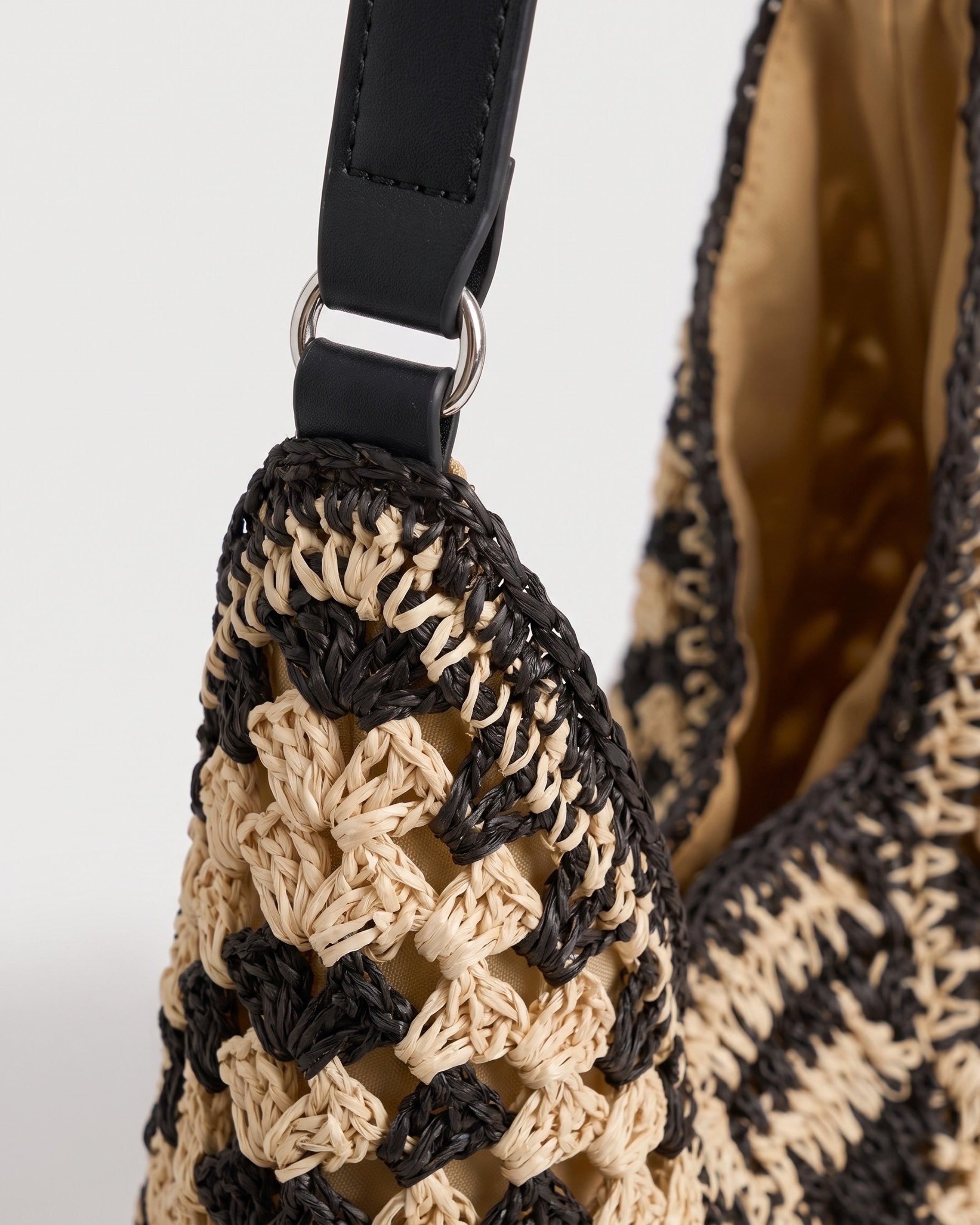 Cutout Straw Shoulder Bag in black khaki — weave detail, RABUKO