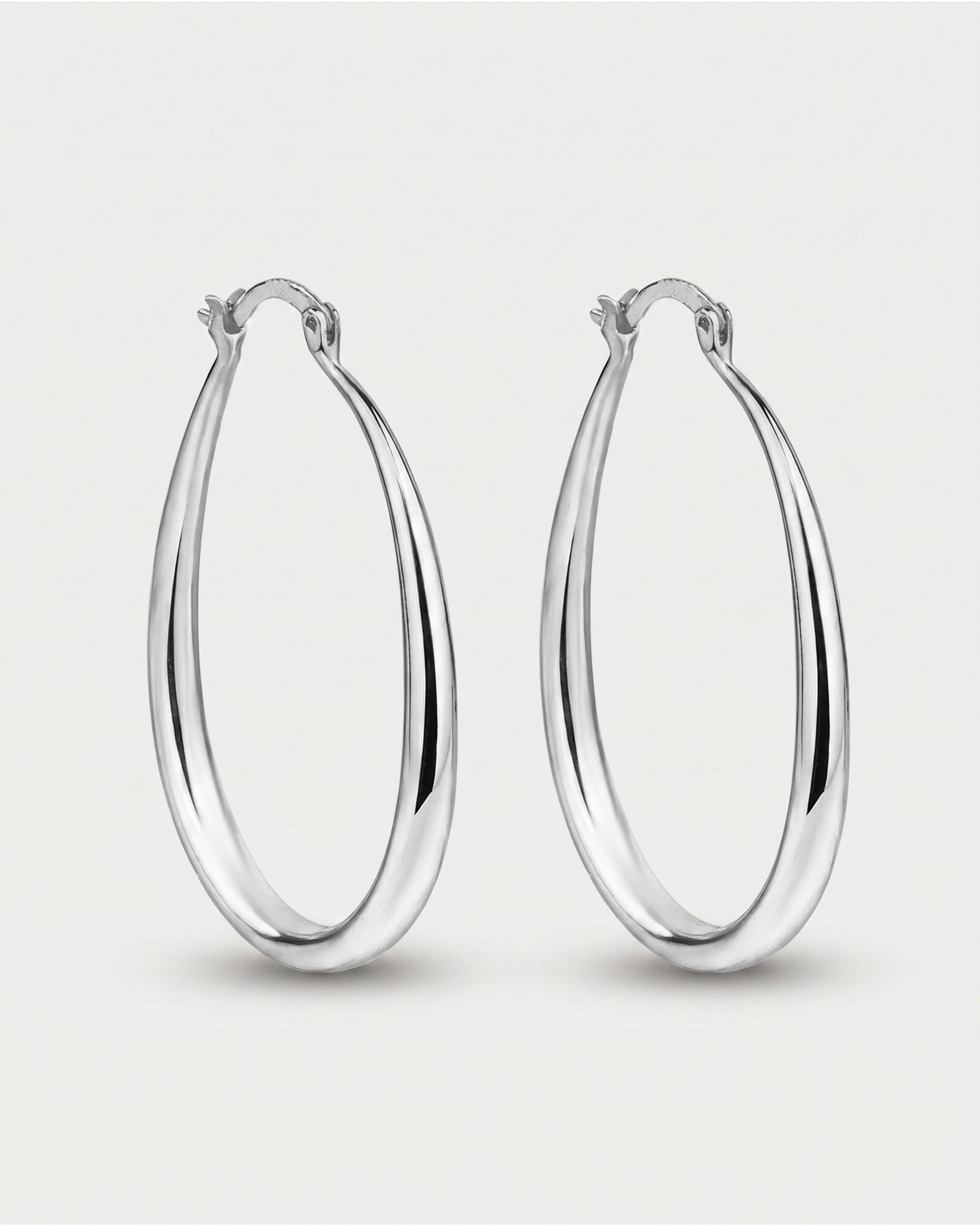 Geometric Oval Earrings in silver — front view, RABUKO