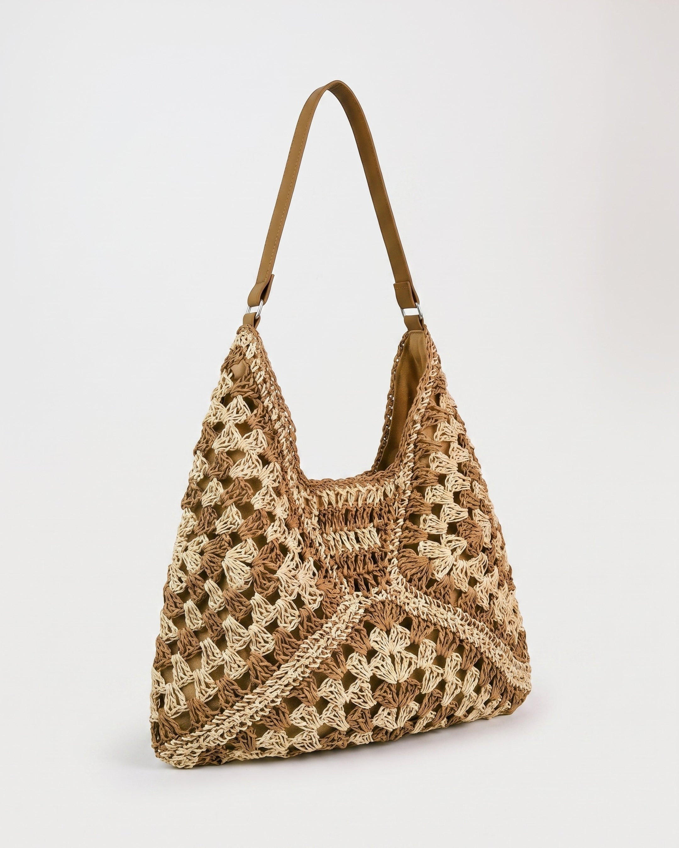 Cutout Straw Shoulder Bag in khaki beige — three-quarter view, RABUKO