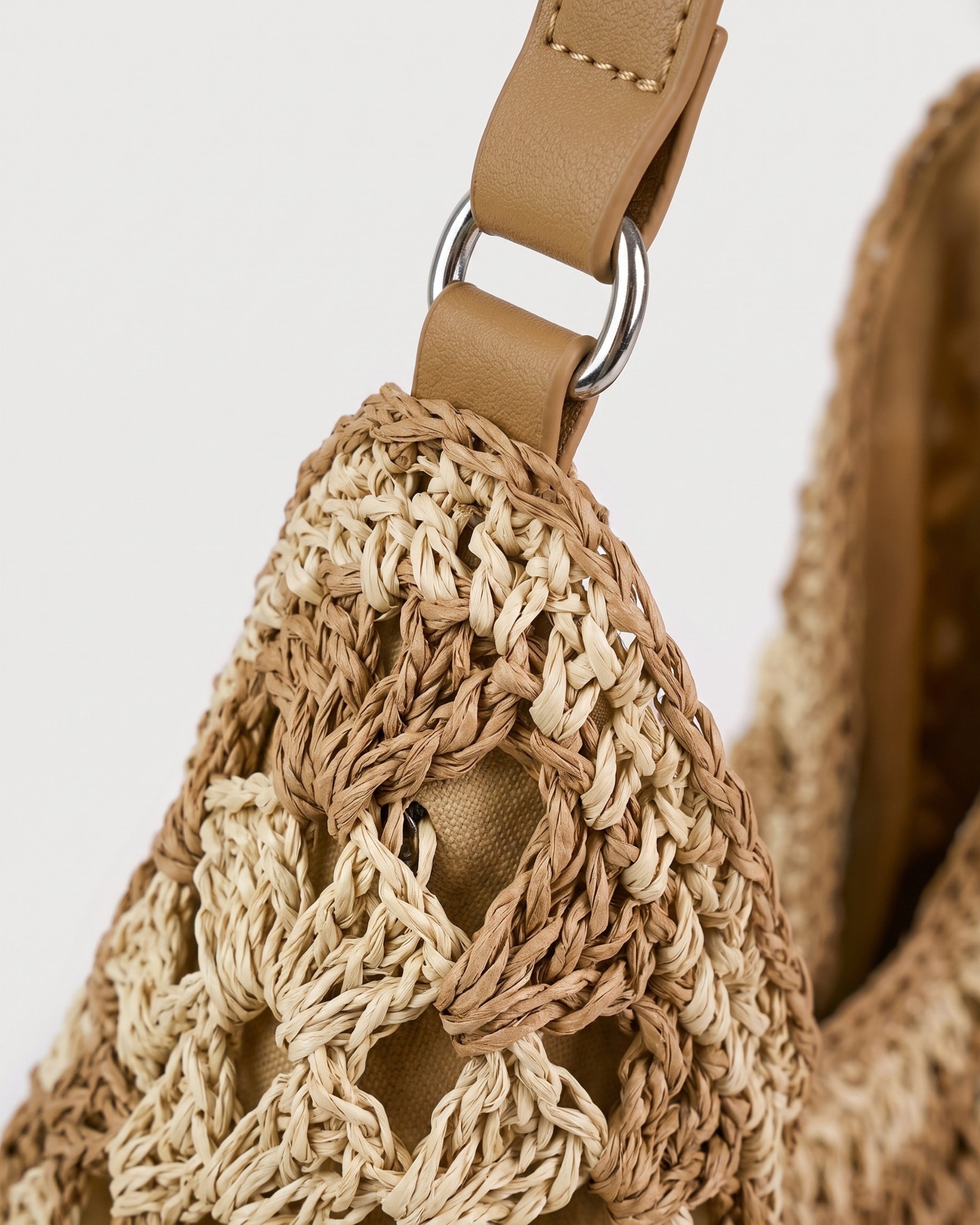 Cutout Straw Shoulder Bag in khaki beige — weave detail, RABUKO