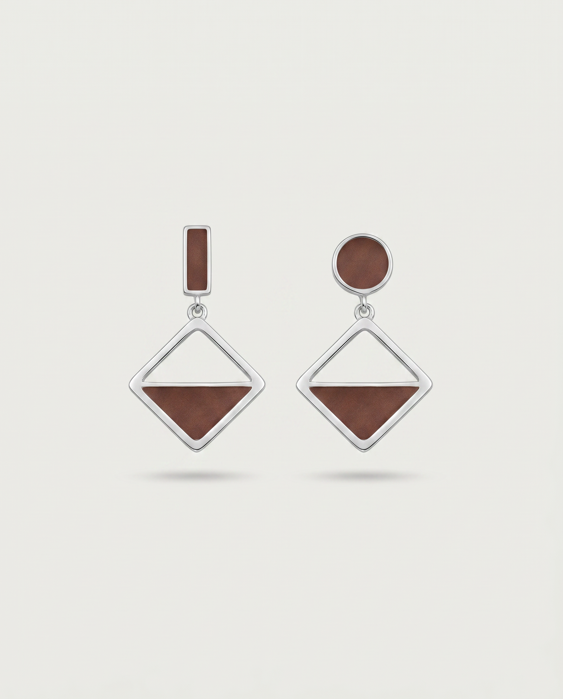 Asymmetric frosted heart earrings — front view, RABUKO
