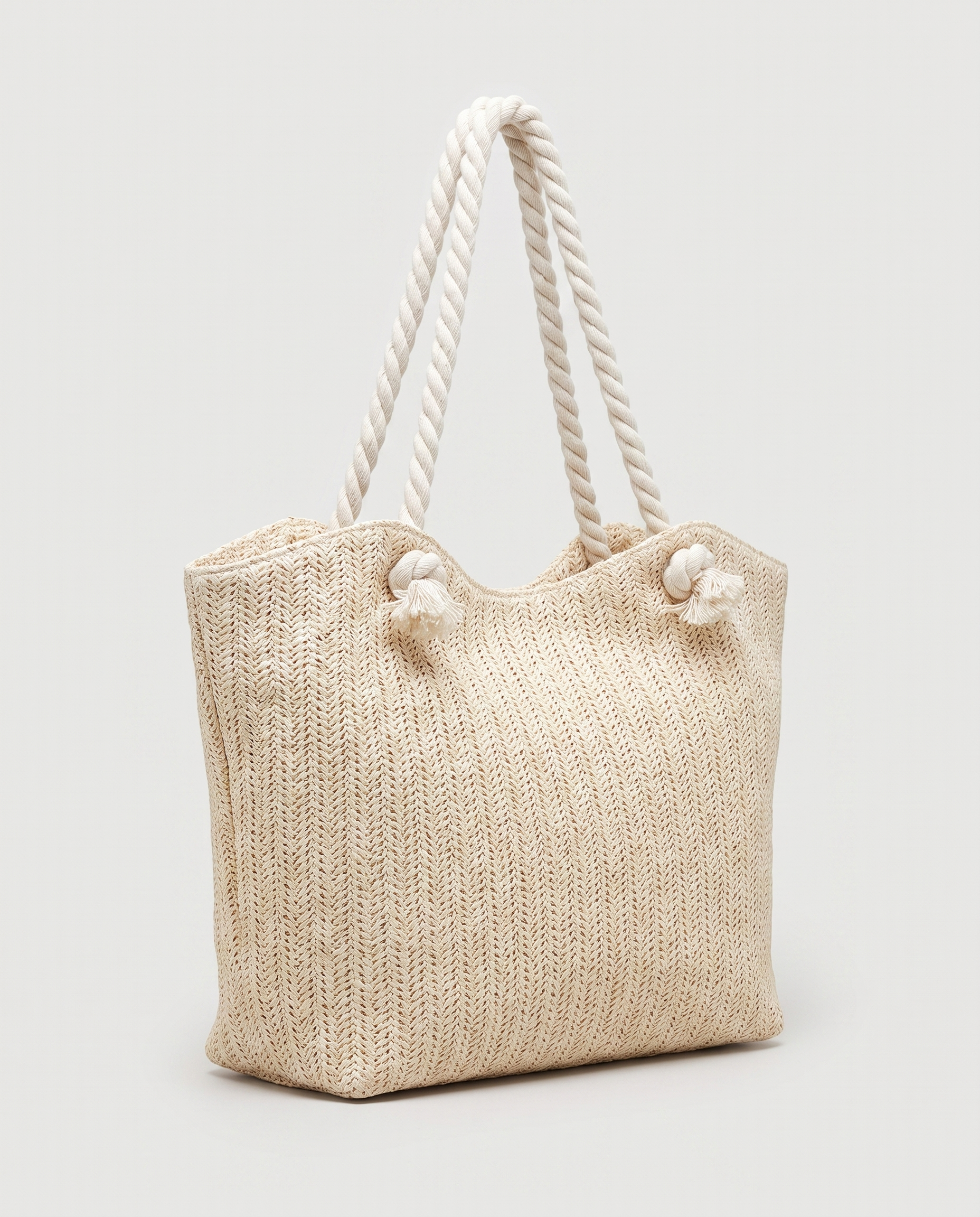 Large Straw Flap Bag in white — three-quarter view, RABUKO