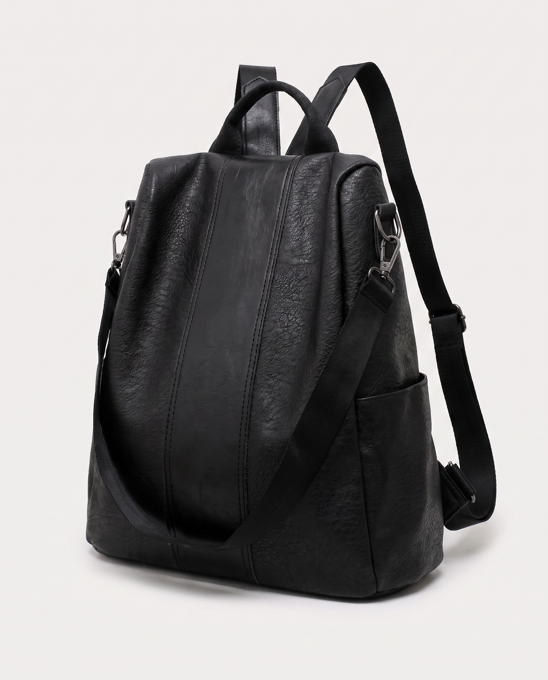 Minimalist City Backpack in black — three-quarter view, RABUKO