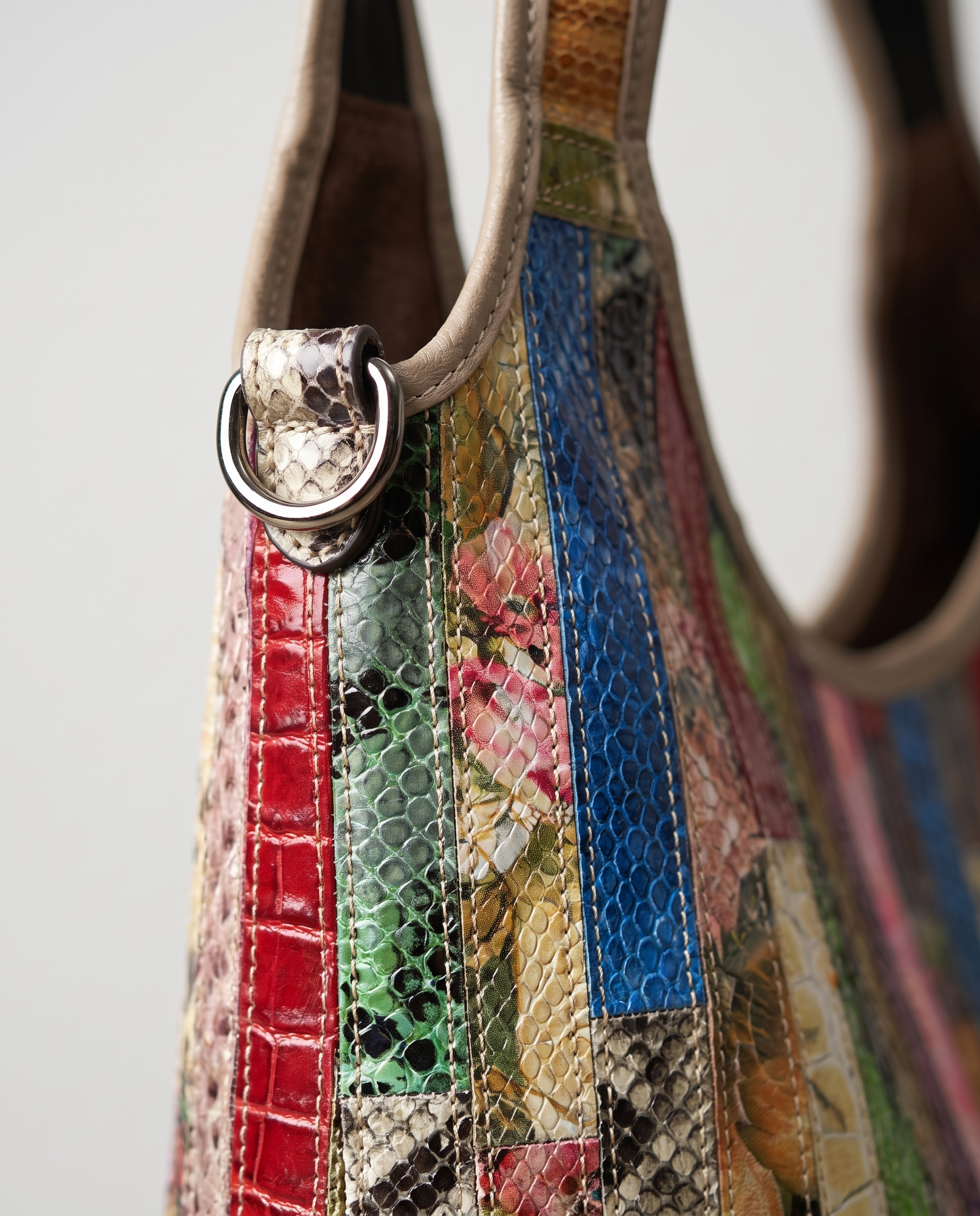 Striped Leather Messenger Bag in snake pattern — leather grain detail, RABUKO