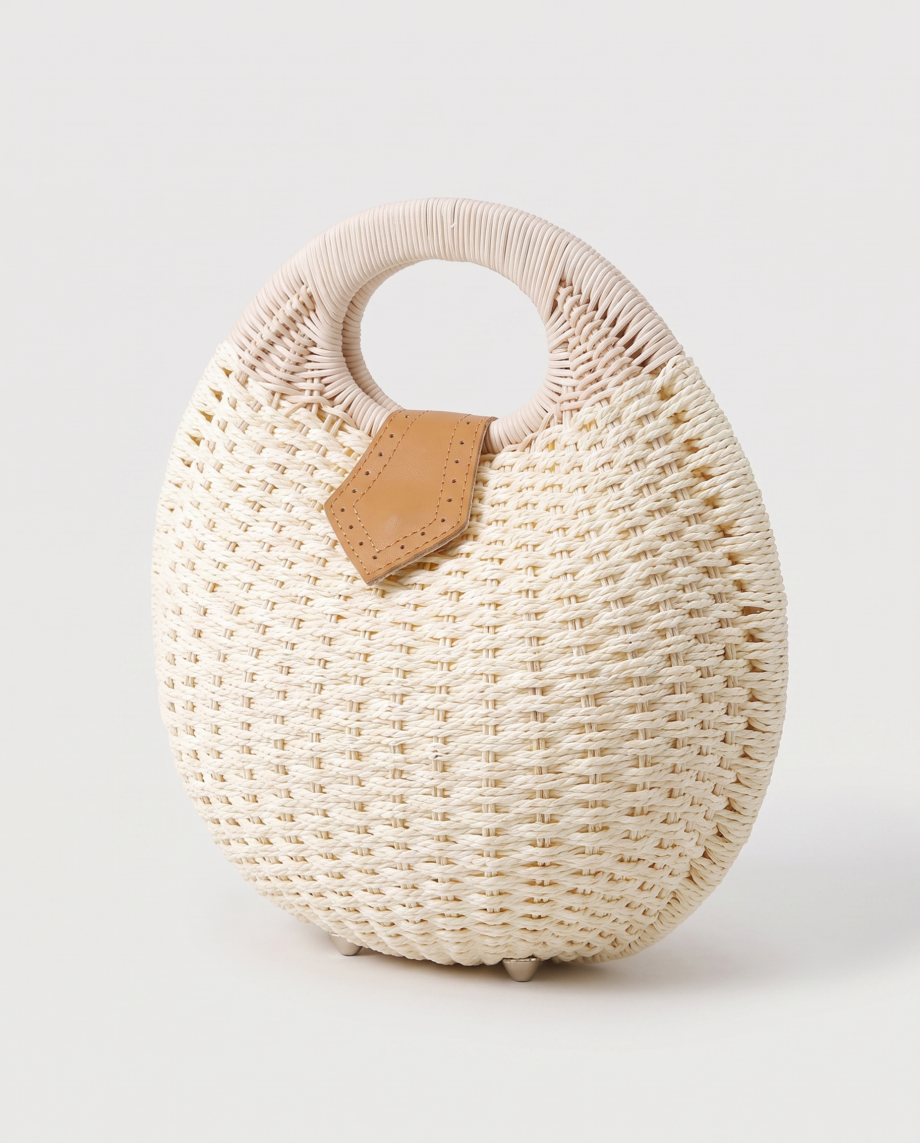 Rattan bag in white — three-quarter view, RABUKO