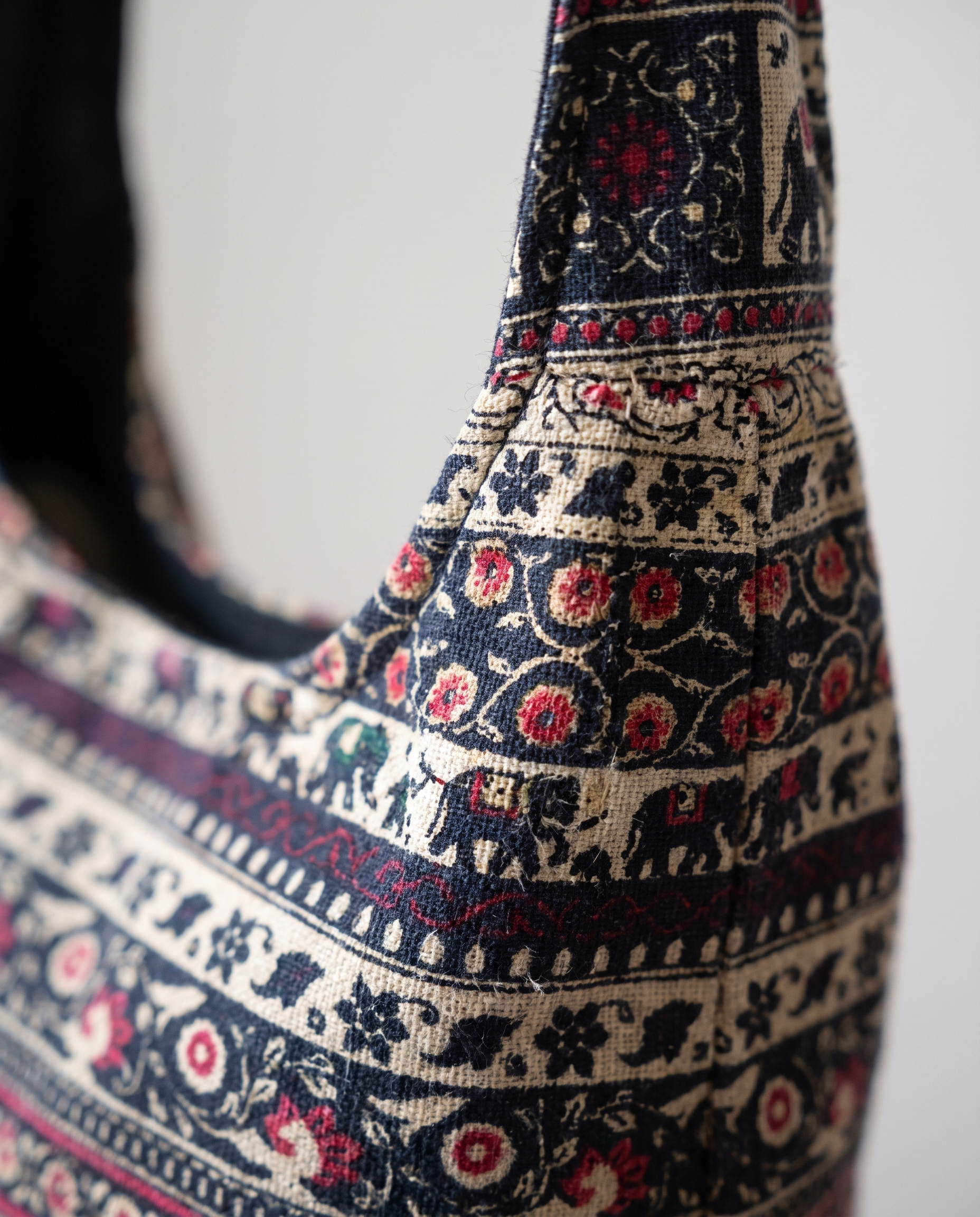 Print crossbody bag in coffee — texture detail, RABUKO