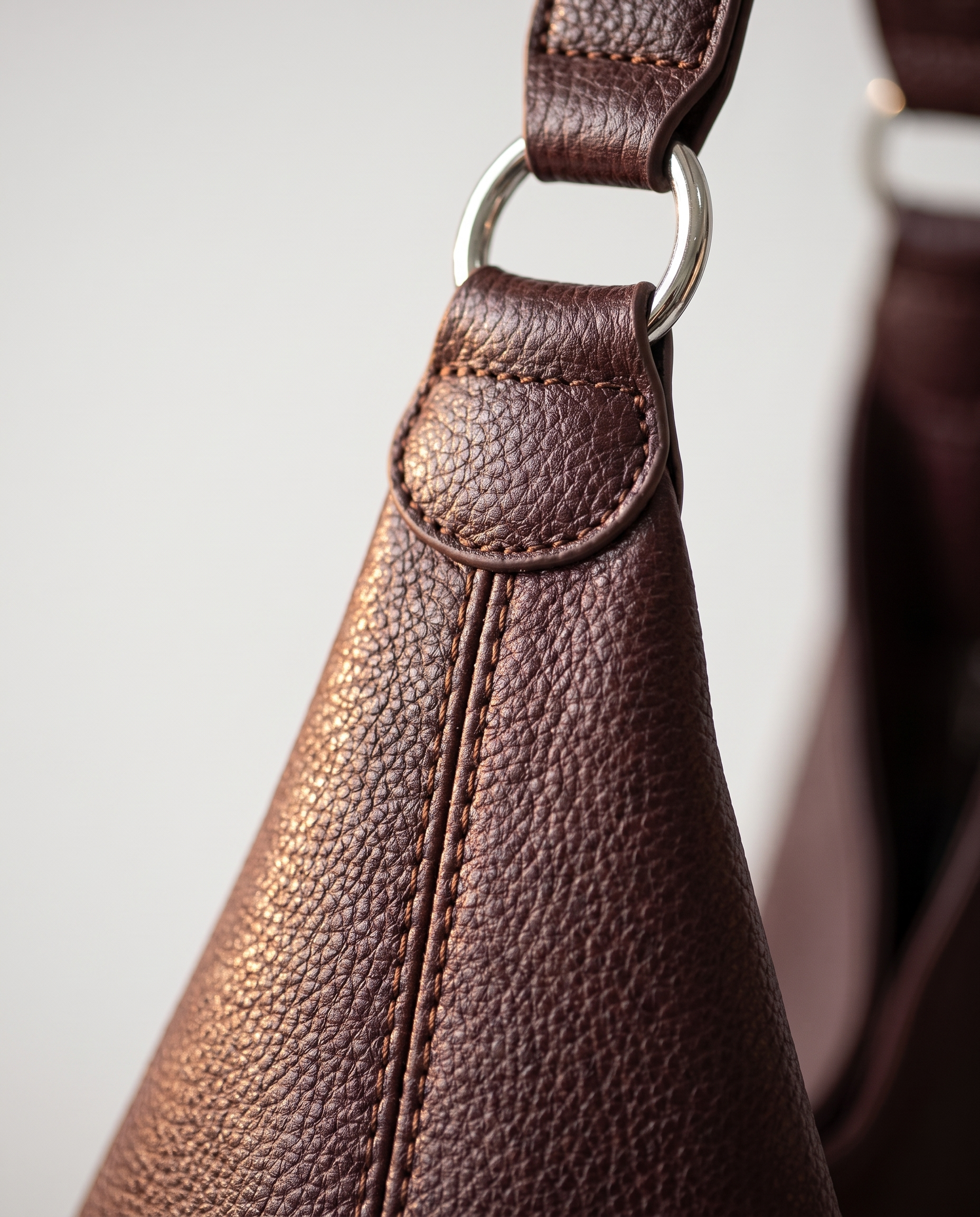 Stitched shoulder tote in brown — texture detail, RABUKO