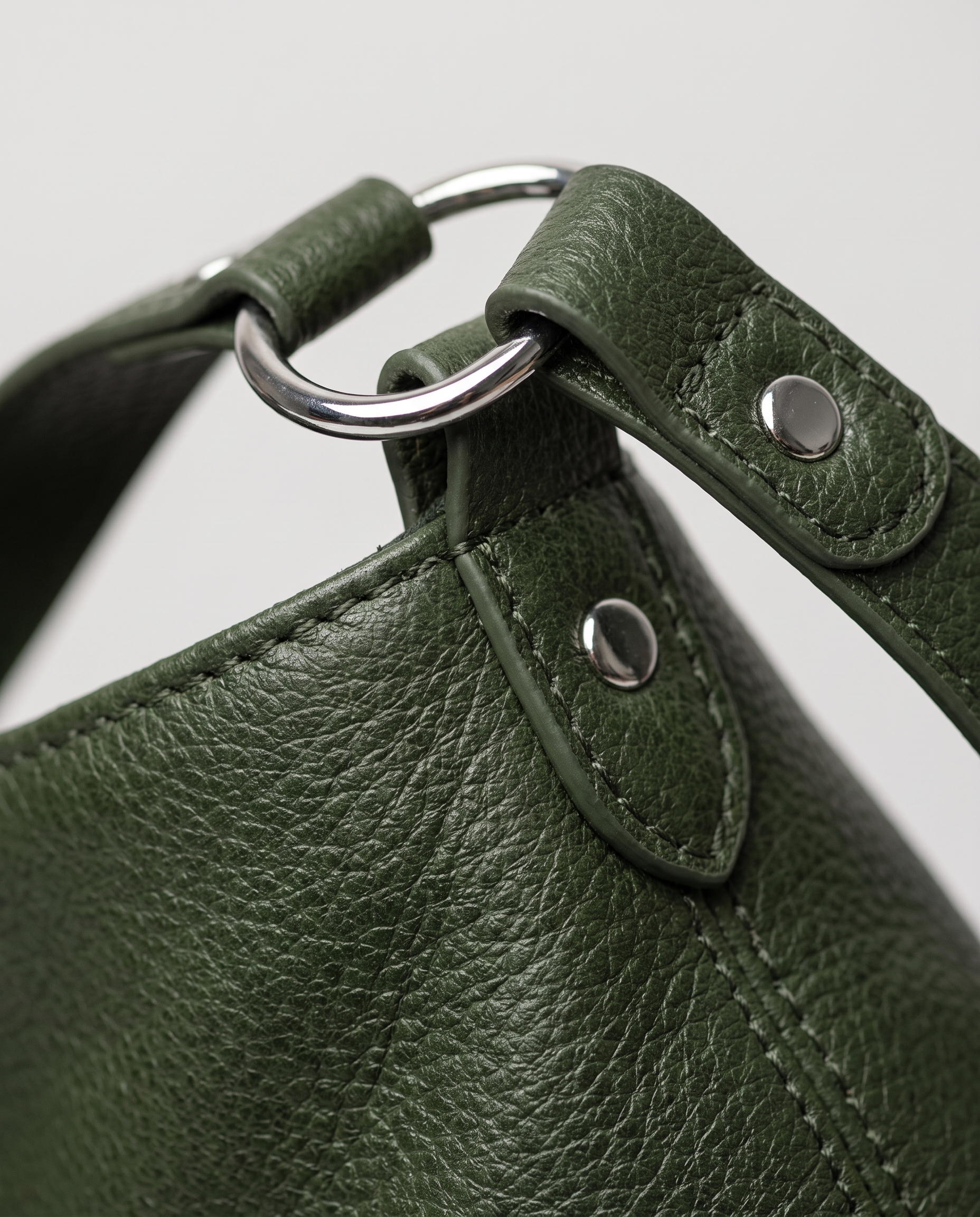 Stitched shoulder tote in dark green — texture detail, RABUKO