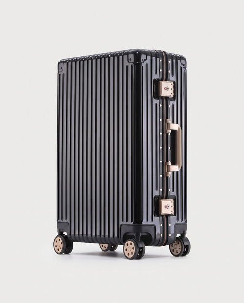 Aluminum frame suitcase in black — three-quarter view, RABUKO