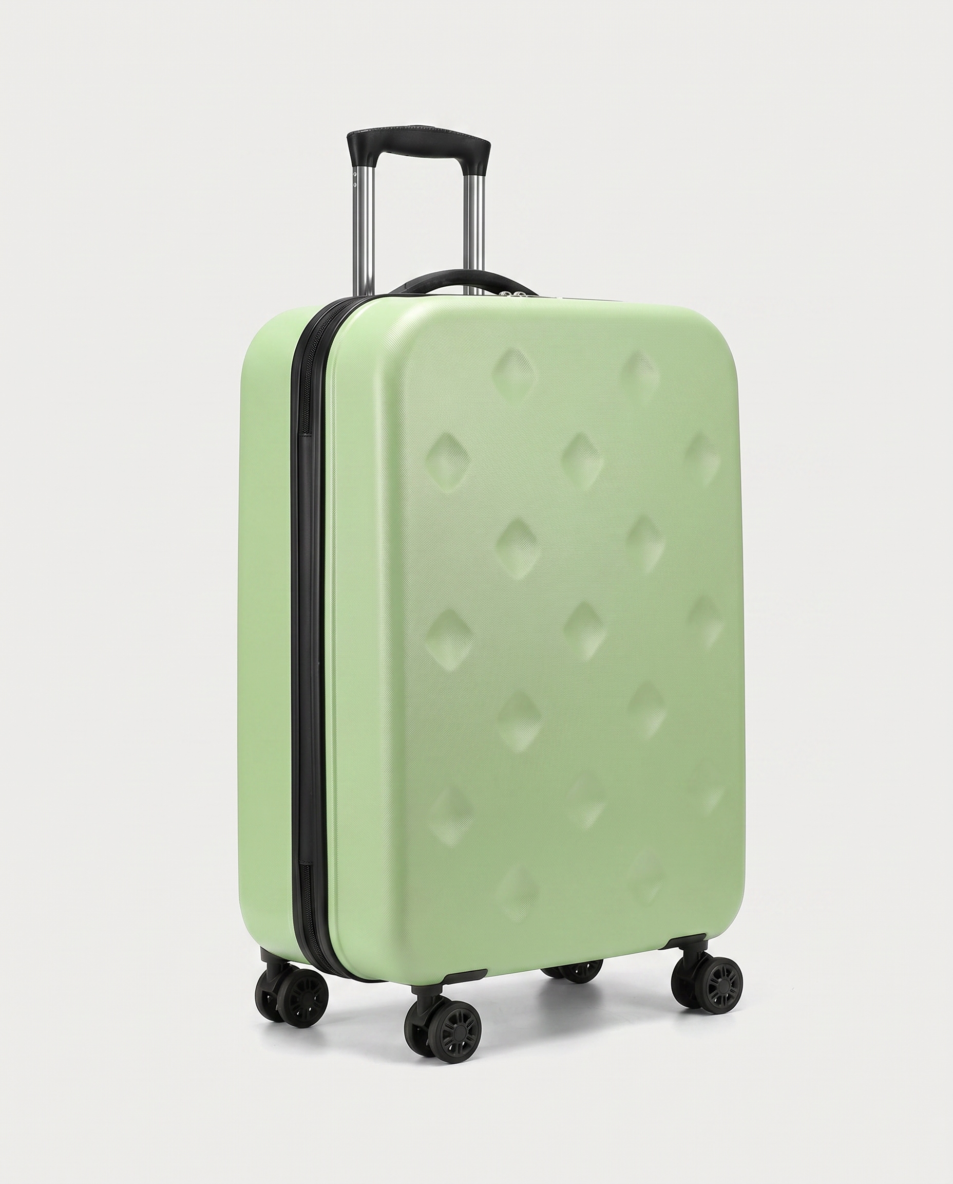 Foldable suitcase in green — three-quarter view, RABUKO