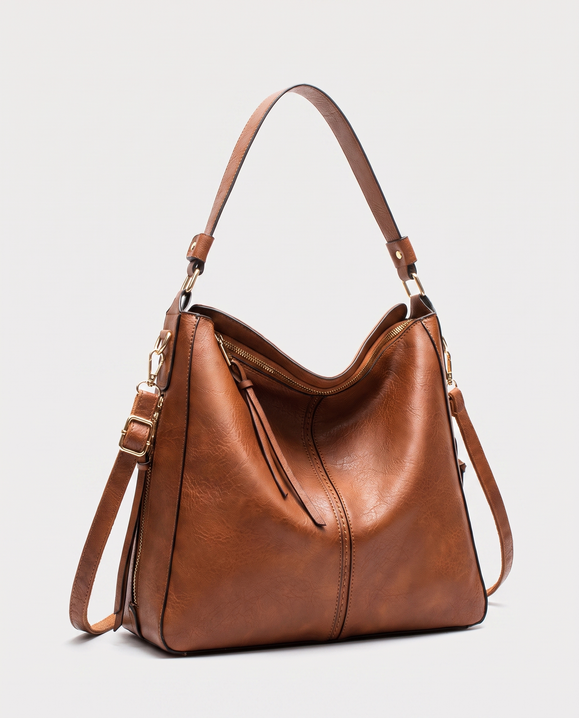 Hobo shoulder bag in brown — three-quarter view, RABUKO
