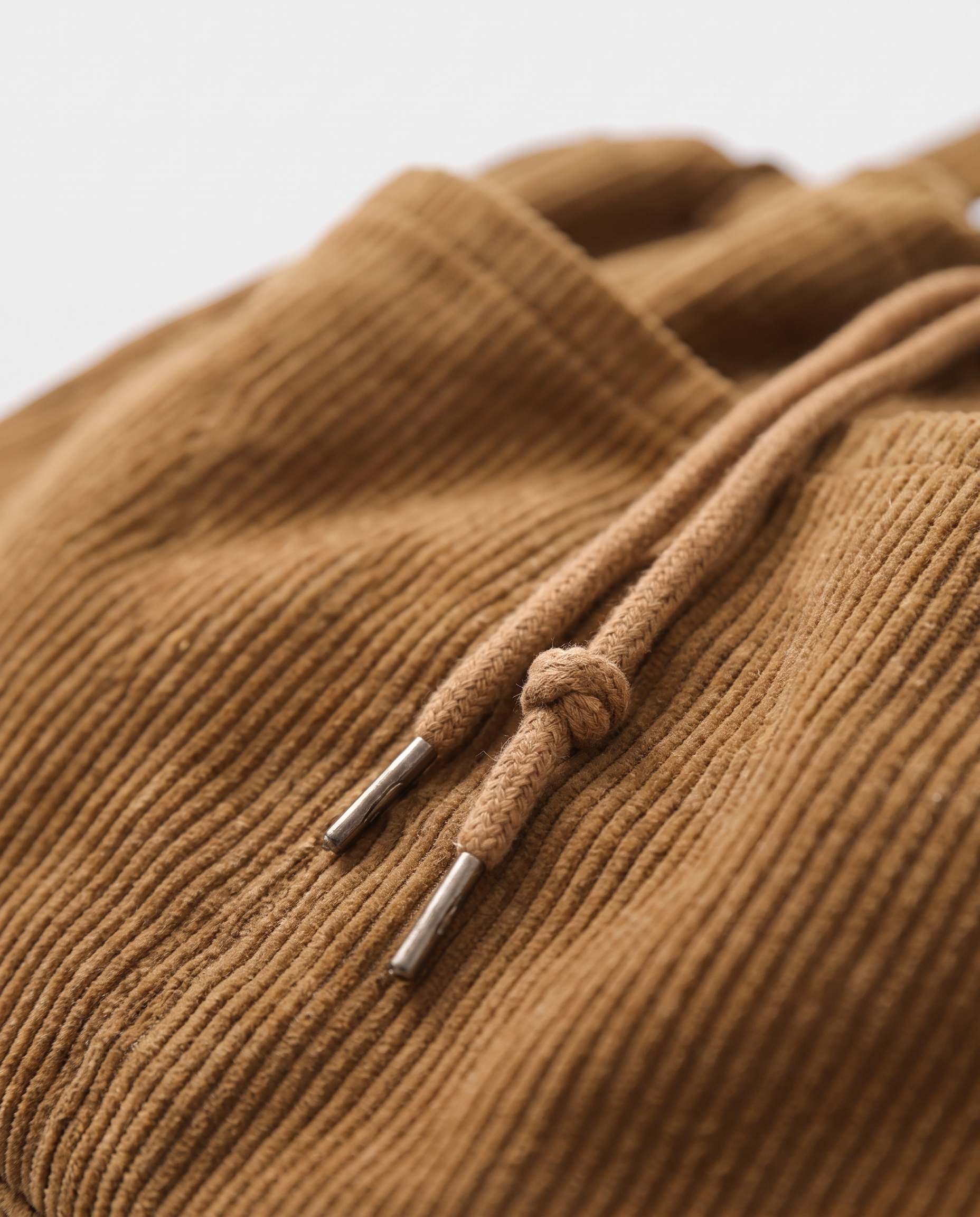 Corduroy drawstring bag in khaki — corduroy texture detail, RABUKO