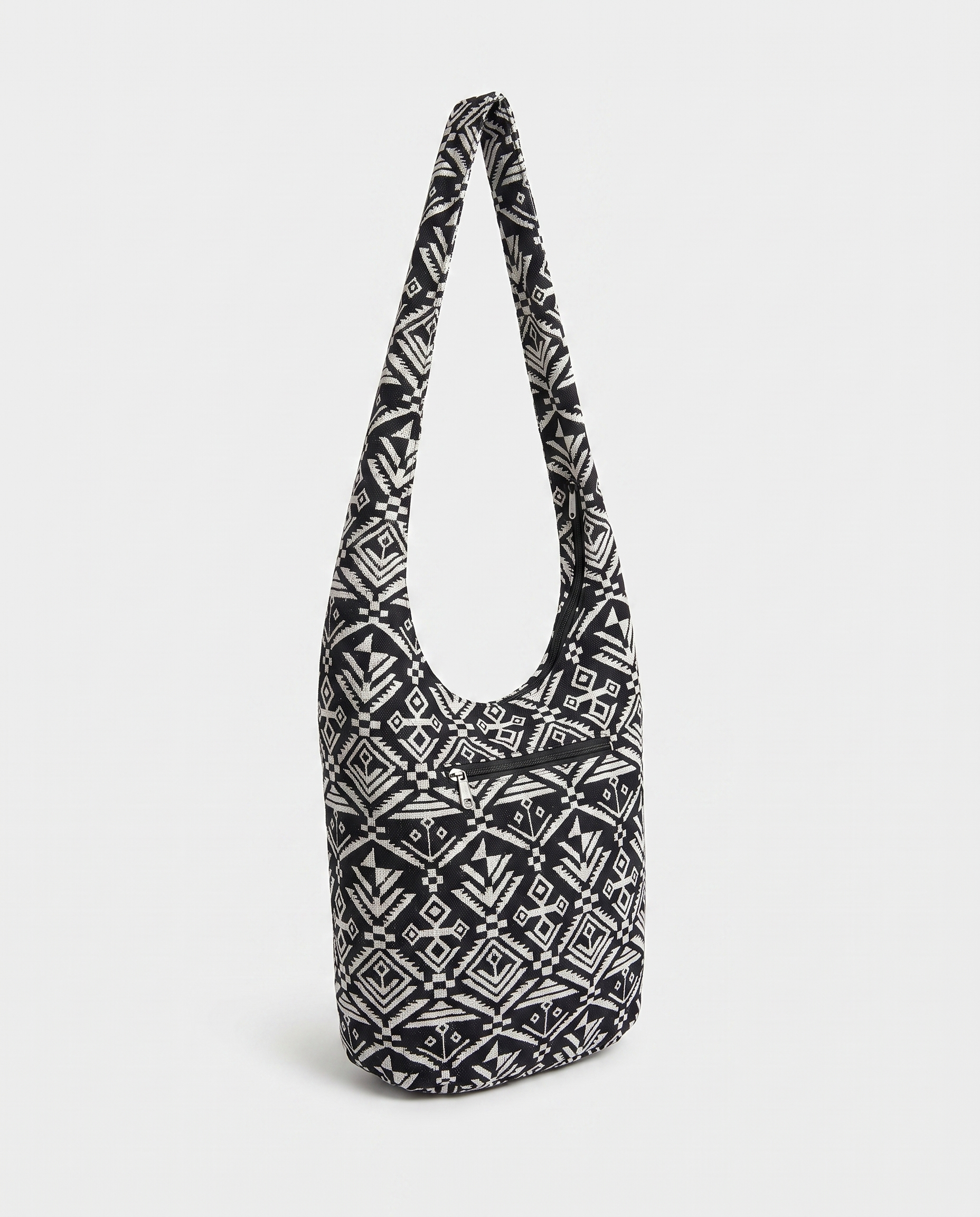 Mandala crossbody bag in Black Diamond print — three-quarter view, RABUKO
