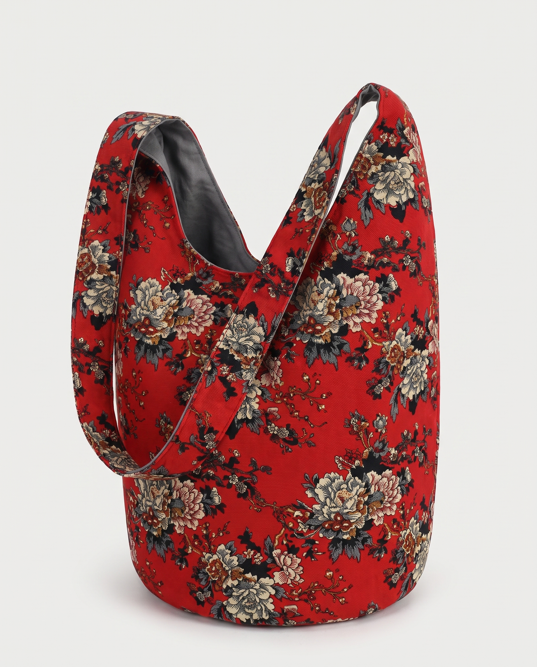 Mandala crossbody bag in Peony print — three-quarter view, RABUKO