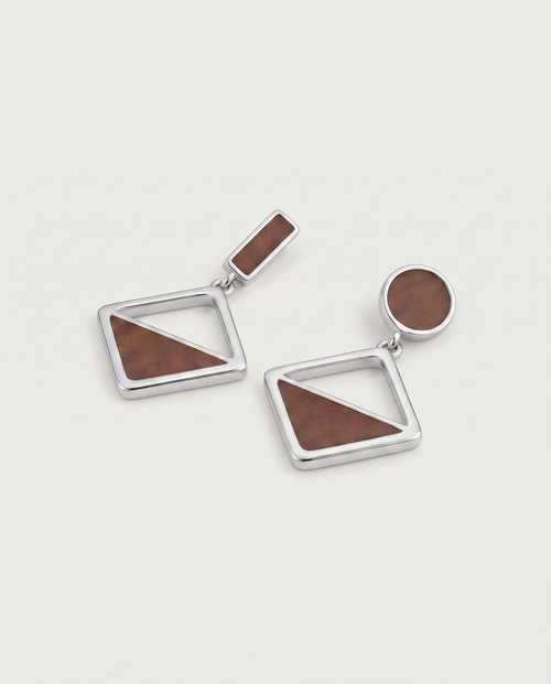 Asymmetric frosted heart earrings — three-quarter view, RABUKO