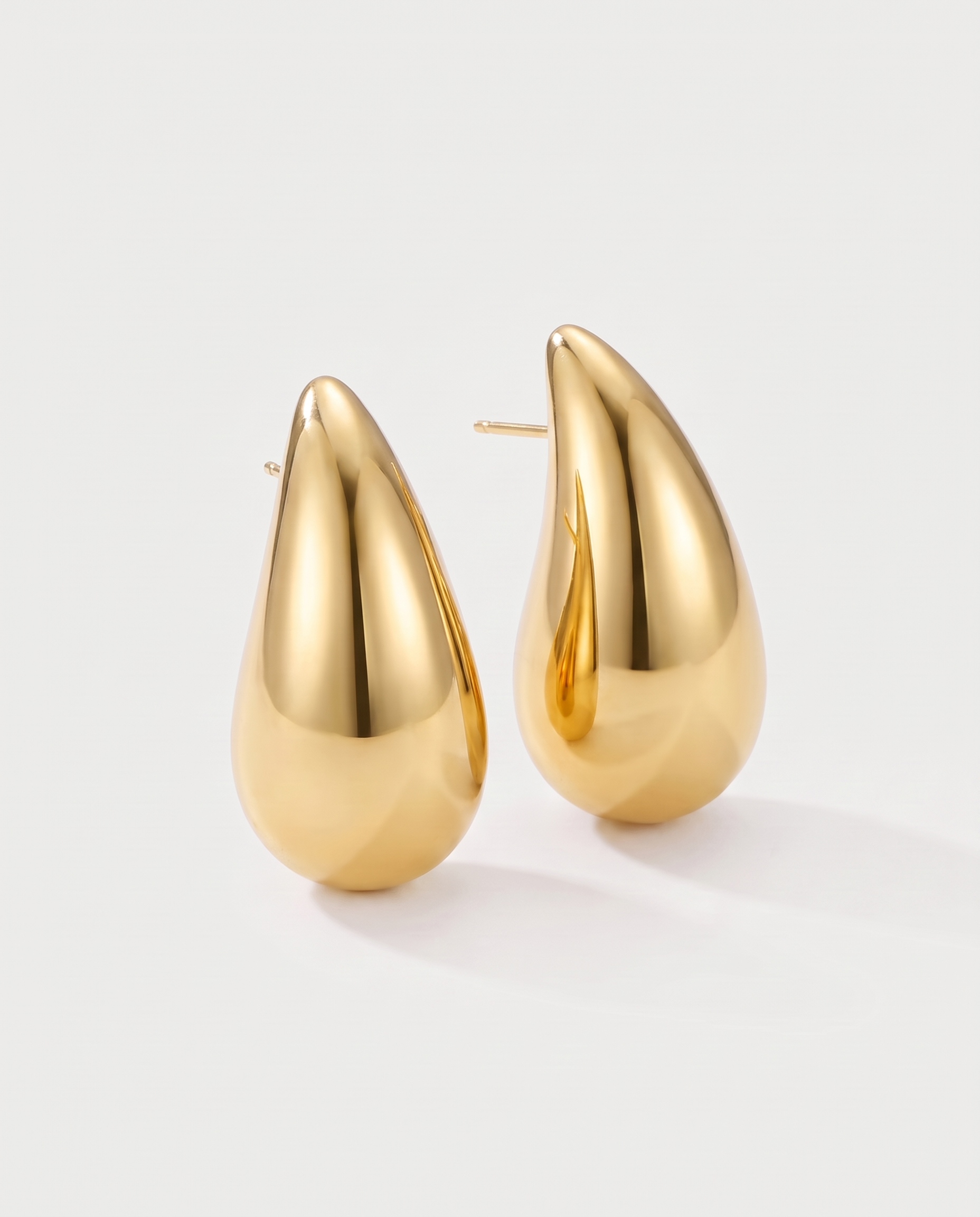 Gold-plated drop earrings — three-quarter view, RABUKO