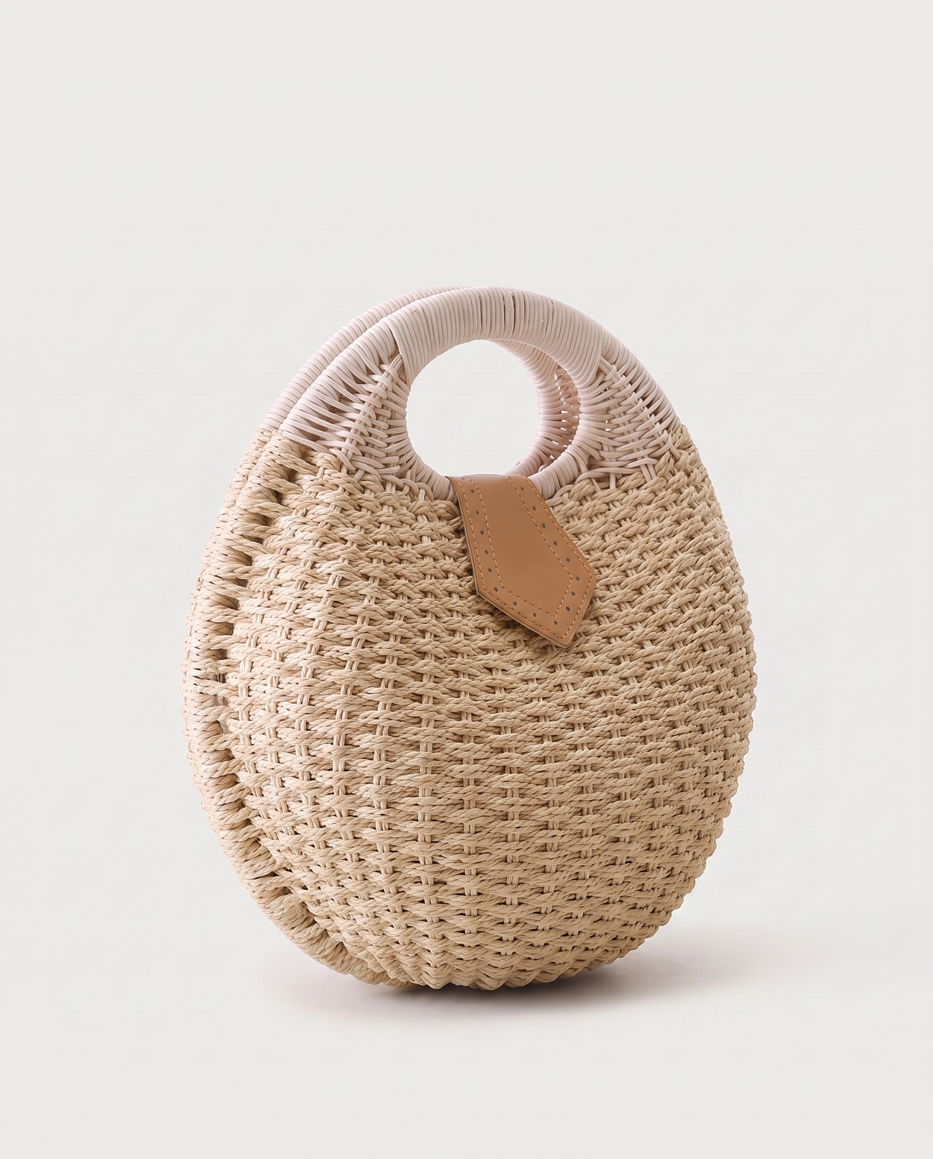 Rattan Top-Handle Bag in beige — three-quarter view, RABUKO