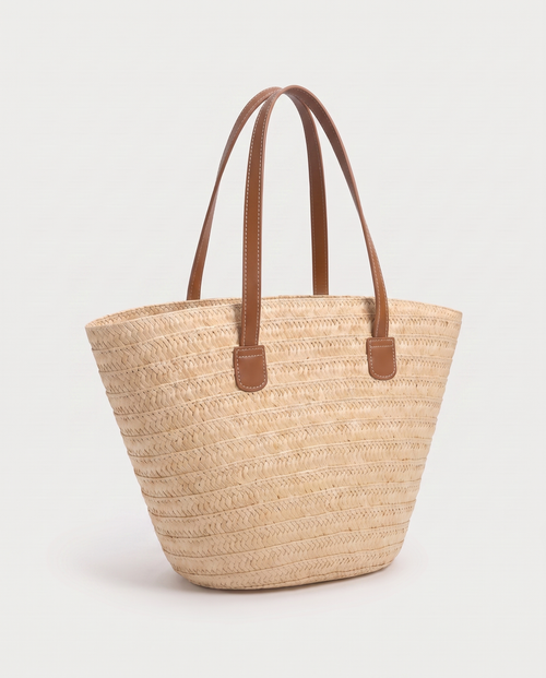 Contrast straw tote in beige — three-quarter view, RABUKO
